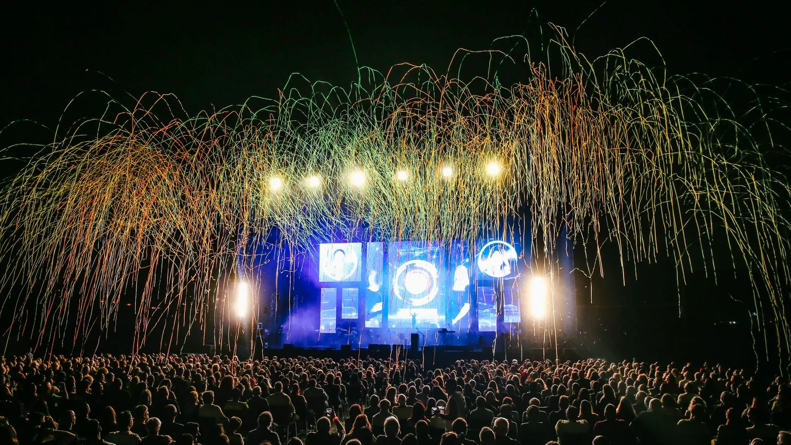 Hip-hop festival crowd and stage, illustrative stock photo